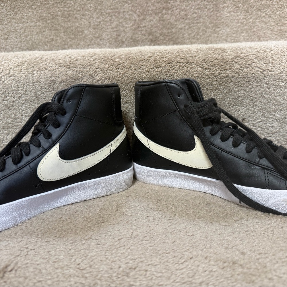 Nike Black Mid-Top Sneakers with White Swoosh